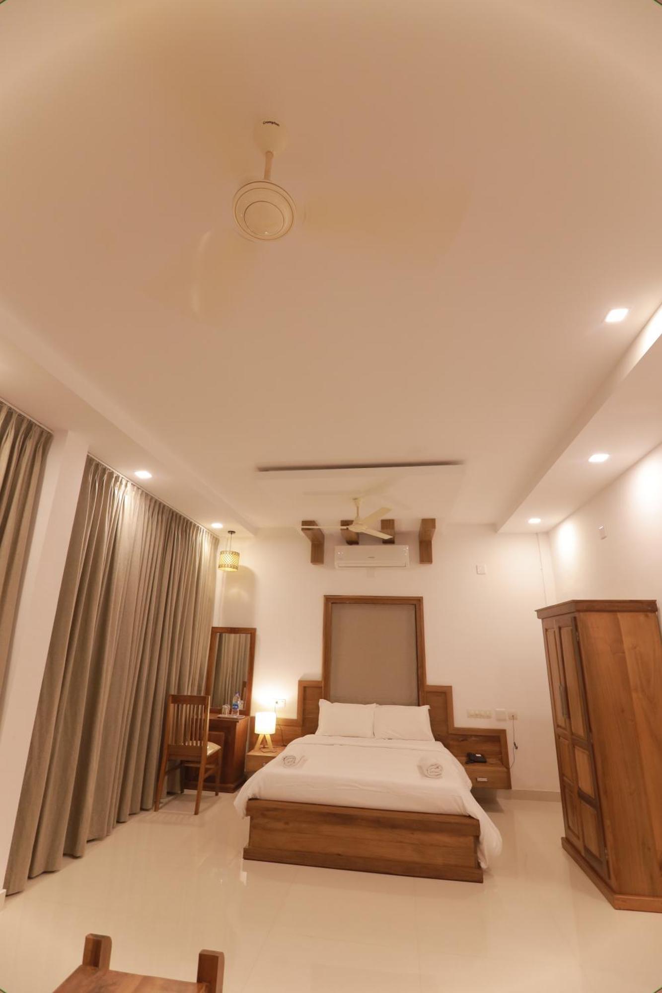 Opm Inn Payyannur Exterior foto